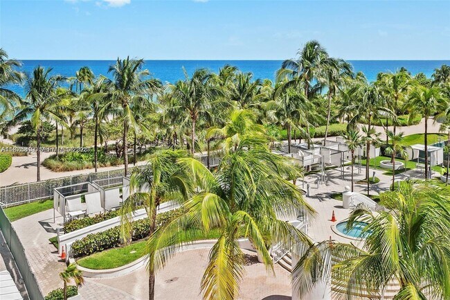 Building Photo - 10275 Collins Ave