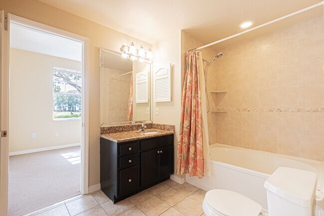 Building Photo - Ground-Level Comfort in North Naples – 2BR Condo in Fairway Preserve at Olde Cypress