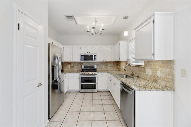 Building Photo - 7408 Tovar Dr