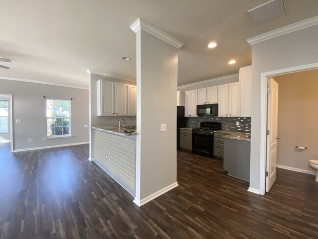 Building Photo - Three Bedroom Home with fenced-in Backyard...