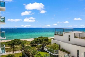 Building Photo - 9511 Collins Ave