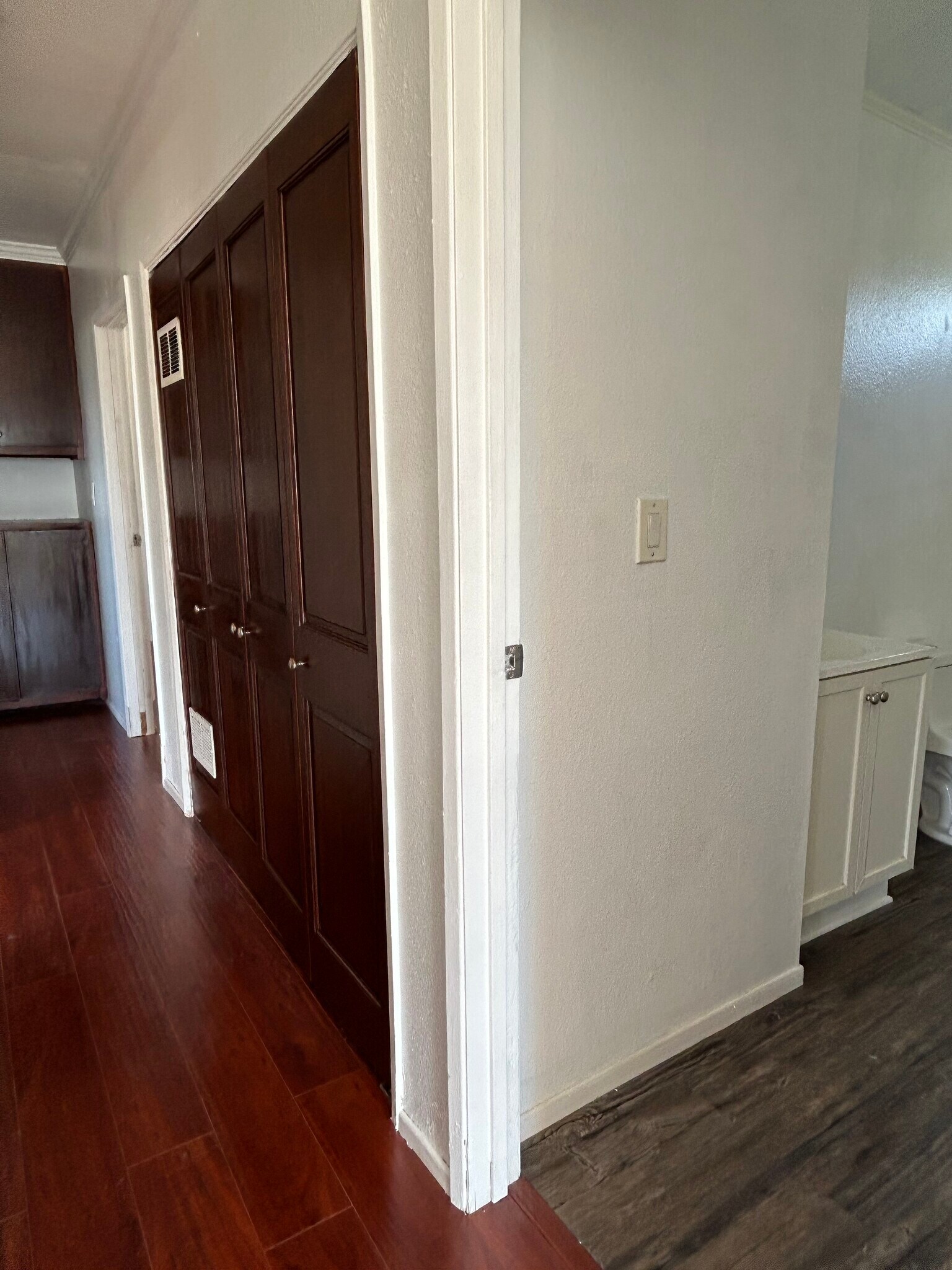 Hallway to laundry room doors - 1156 N Chicago St