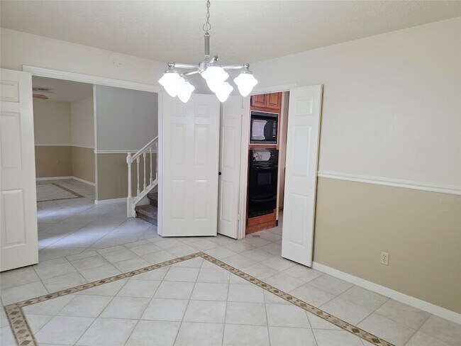 Building Photo - 10306 Jockey Club Dr