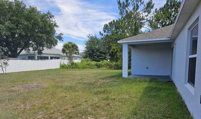 Building Photo - *** 1ST MONTH RENT FREE*** BEAUTIFUL 4/2 HOME IN PALM COAST