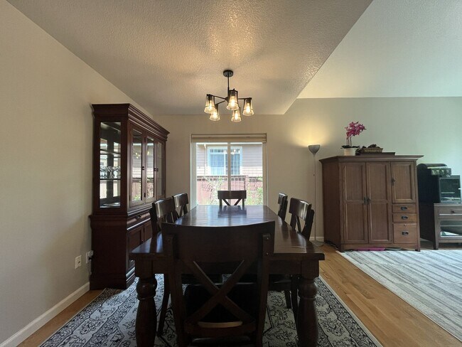Building Photo - Spacious 3-Bedroom Home with Two Living Areas, Private Balcony, Fireplace & Attached 2-Car Garage