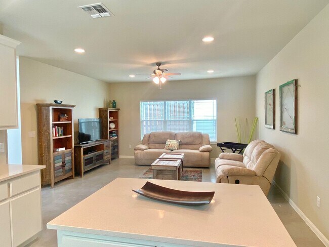 Building Photo - This charming two-story home, built in 2018, offers a spacious open floor plan perfect for casual...