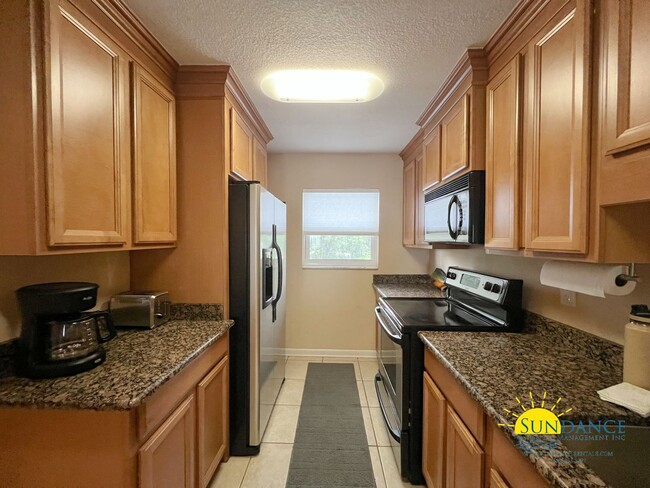 Building Photo - Destin furnished condo INCLUDES A BOAT SLI...