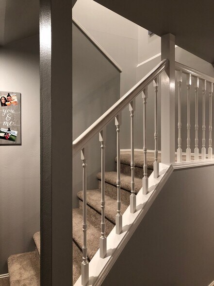 stairway with storage underneath. - 9915 NE 124th St