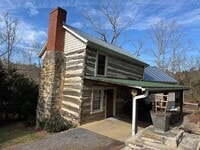 Building Photo - Renovated Log Cabin