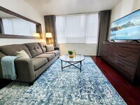 Building Photo - Modern Downtown Living with Comfort, Security & Style