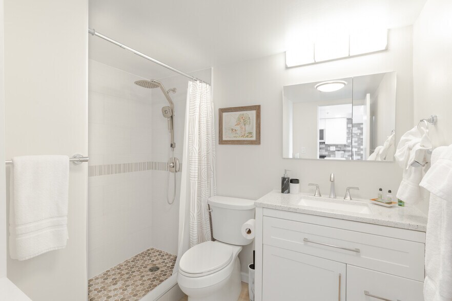 Your personal oasis awaits in this spa-like setting, featuring a luxurious dual showerhead - 1777 Ala Moana Blvd