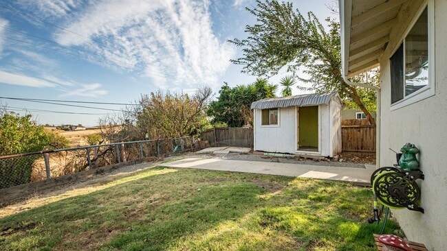 Building Photo - 4 Bedroom home with RV parking