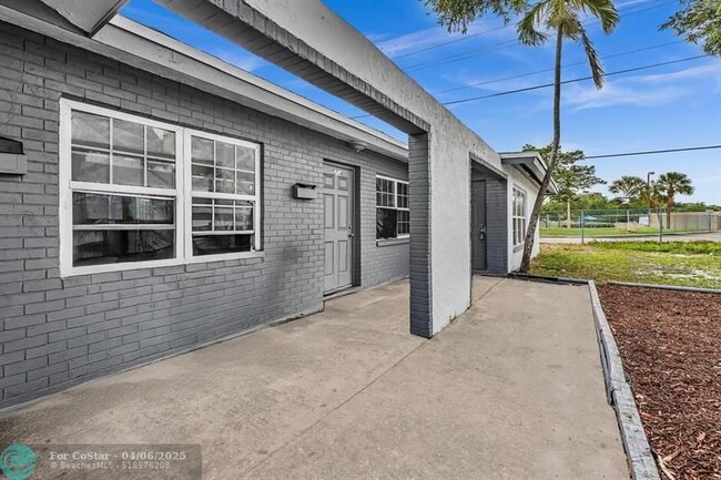 Building Photo - 5738 NW 27th Ct