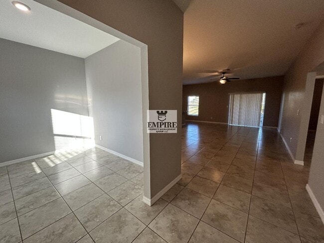 Building Photo - COMING SOON! 3 Beds + Den, 2 Baths, Screened Lanai & More!