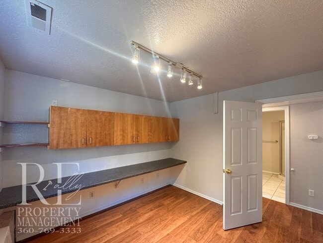 Building Photo - Freshly Painted East Bremerton Home with Expansive Decks & Flexible Living Space
