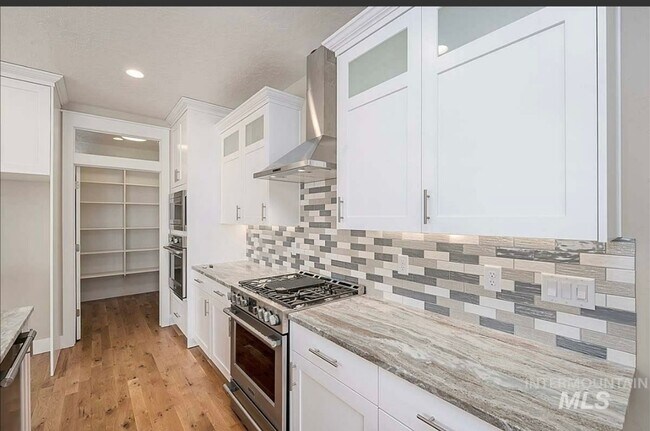 Building Photo - Beautiful Custom Single Level Boise Home A...