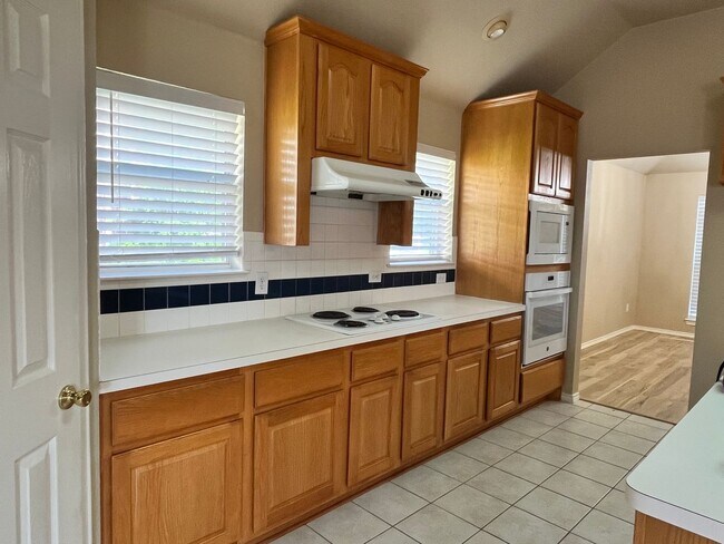 Building Photo - Beautifully Updated 4-Bedroom Home with Community Pool & Excellent Schools!