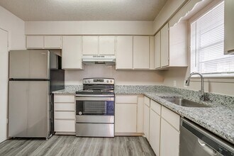 Building Photo - ASK ABOUT OUR HALF OFF FIRST TWO MONTH'S RENT