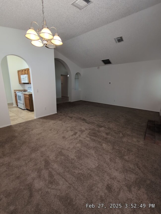 Building Photo - Welcome to your new cozy, immaculate and spacious home!