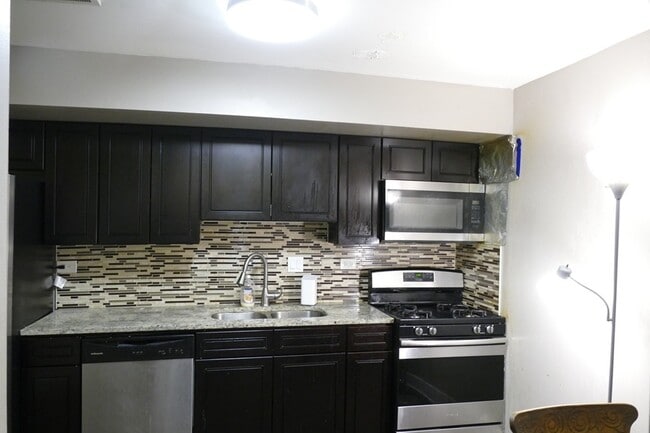 Building Photo - 7724 Woodward Ave