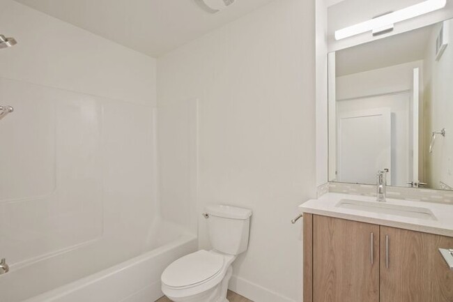 Building Photo - Sunnyside 12 Apartments Available! 1 bed, ...