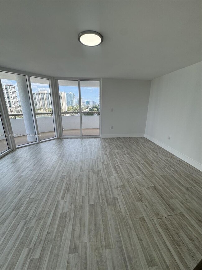 Building Photo - 15645 Collins Ave