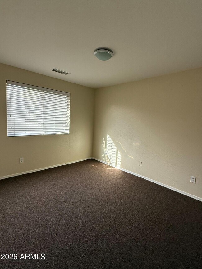 Building Photo - 8460 W Lewis Ave