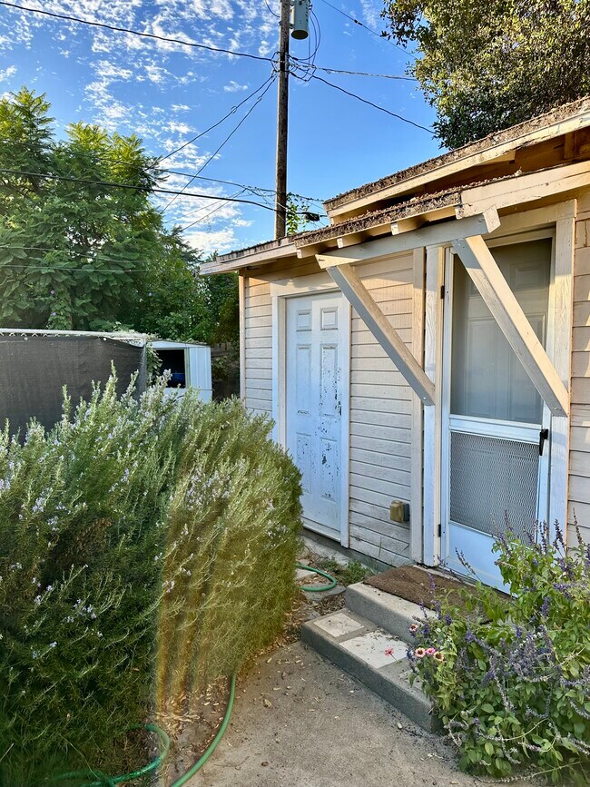 The left door is the attached laundry room - 189 S Roosevelt Ave