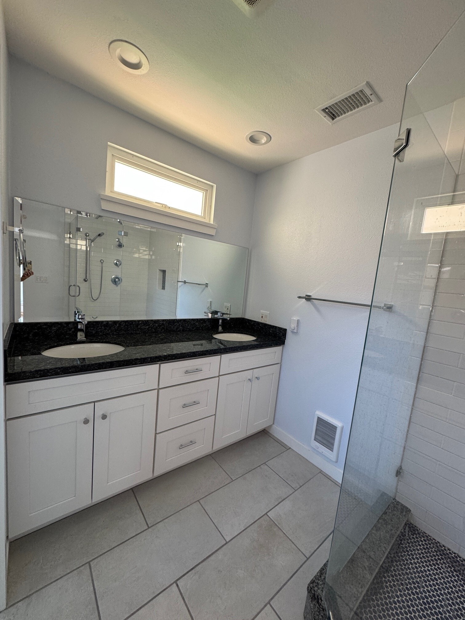 Master bathroom double vanity sinks.All custom tile & granite countertops. - 22471 Loch Lomond Dr