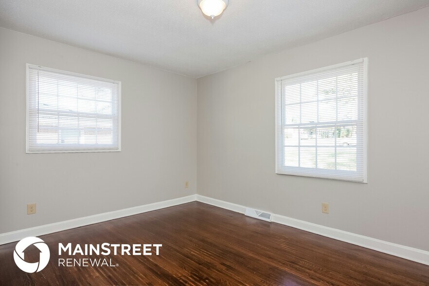 Building Photo - 8711 Farmwood Ct