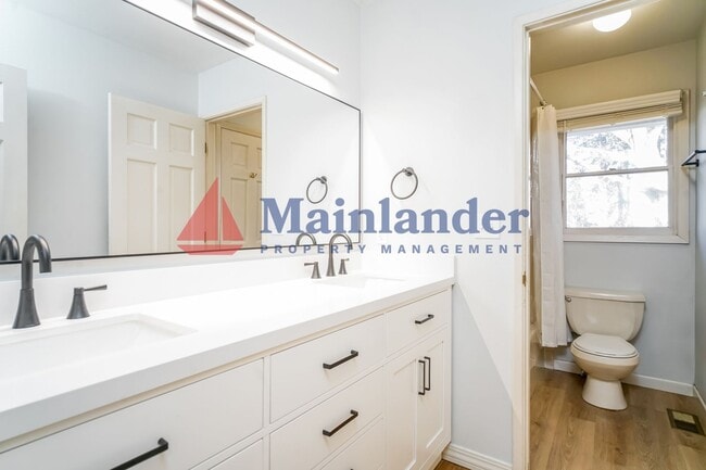 Building Photo - *PRICE REDUCTION* Beautiful 4 Bedroom Home with Terraced Backyard!