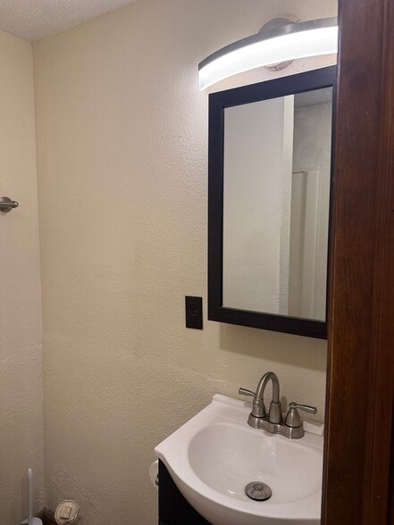 Sink and medicine cabinet - 1810 7th Ave