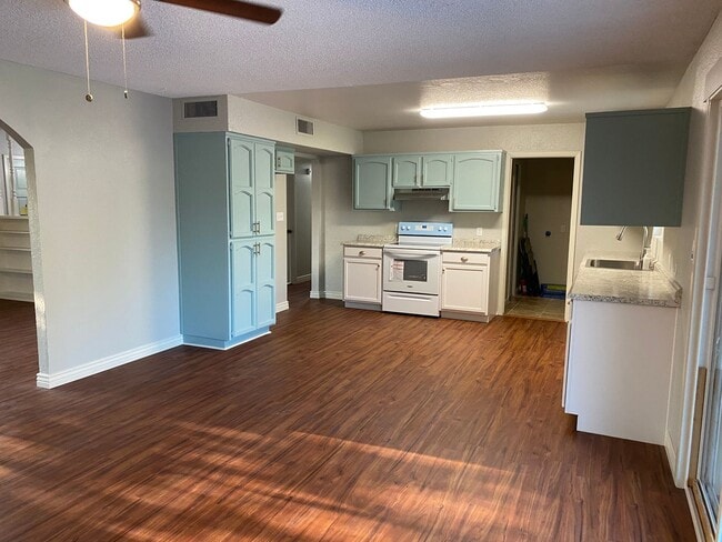 Building Photo - 3 bedroom home with large living room on a large corner lot with lots of room for play.