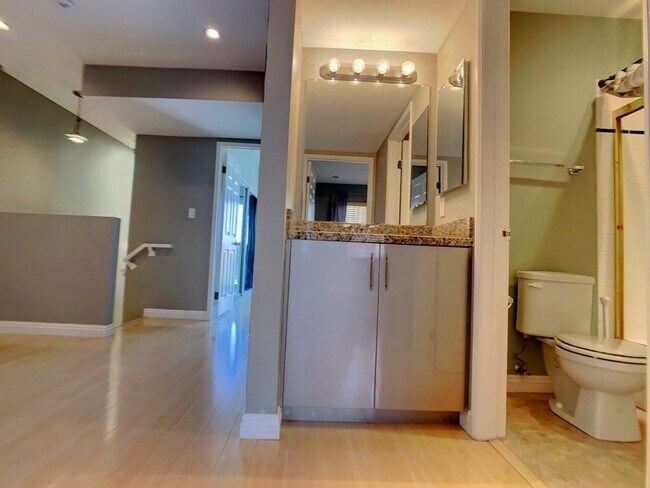 Building Photo - A Beautiful updated trilevel townhome in W Figueroa is now available for rent.