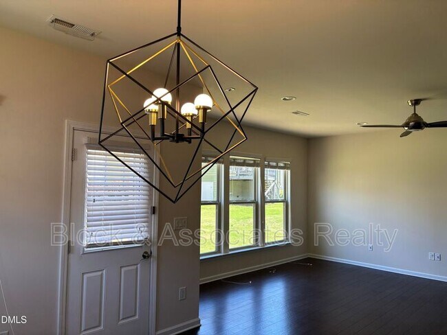 Building Photo - 1009 Magnolia Blossom Ln