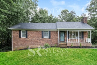 Building Photo - Enjoy living the good life in this 4 BR, 3 BA brick rancher