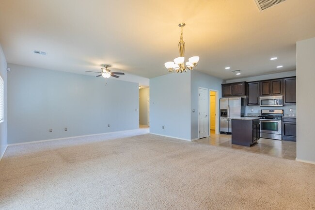 Building Photo - Inviting 4 Bed 2 Bath Home - Solar Panels & In The Golf Course Area!