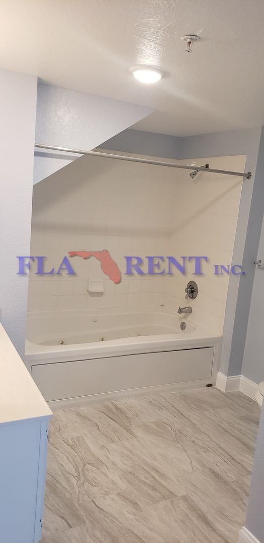 Building Photo - 4 BR / 3 FULL BATH (INCLUDES 2 MASTERS) 2 STORY (NEAR DISNEY!) GATED COMMUNITY WITH COMMUNITY POO...