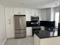Building Photo - Spacious-Bright 3 Bedroom 2.5 Two story Bathroom Condo