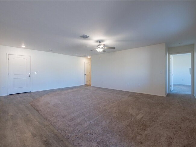 Building Photo - Spacious 4-Bedroom Home with Open Layout & Turf Backyard