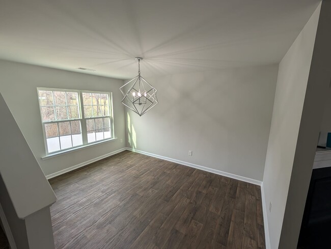 Dinning room with chandelier included. - 1682 Weatherend Dr