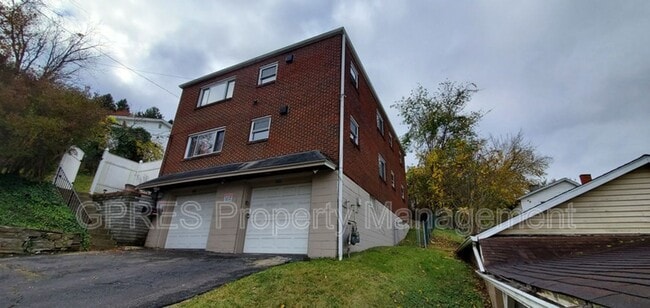 Building Photo - 5706-5708 Poketa Rd.