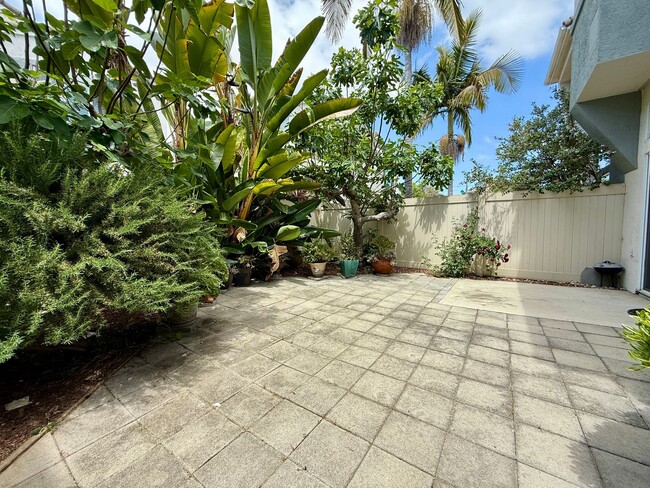 Building Photo - Spacious 3 Bedroom 2.5 Bath Townhouse with Private Garden Patio & a Community Pool/Spa! Attached ...
