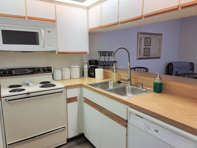 Building Photo - Bird Bay Village Annual Rental – Furnished 1st Floor Unit with Covered Parking