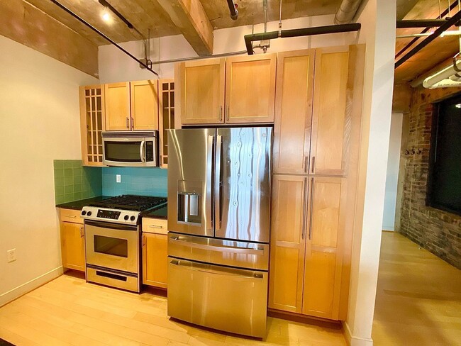 Building Photo - Stunning Industrial-Contemporary One Bedro...