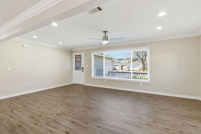 Building Photo - Turnkey Open-Concept Home with Central A/C & Solar