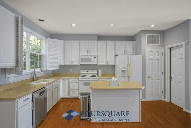 Building Photo - Lakefront Townhome with 1st Floor Bedroom, Fireplace & 2-Car Garage – In Raleigh