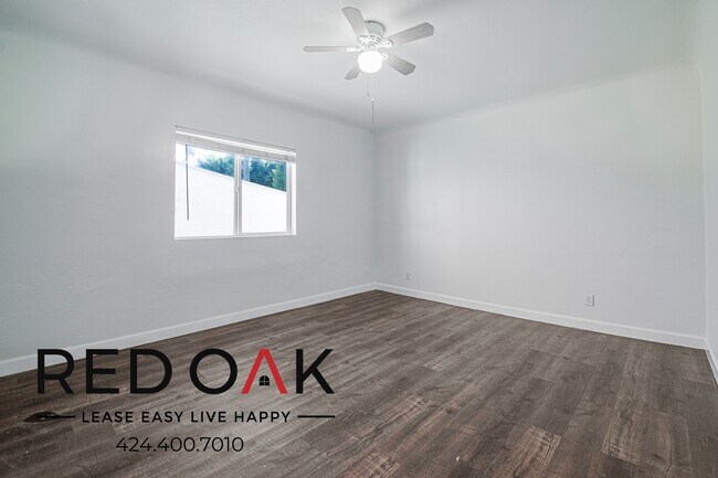 Building Photo - 1847 1/2 W Florence Ave