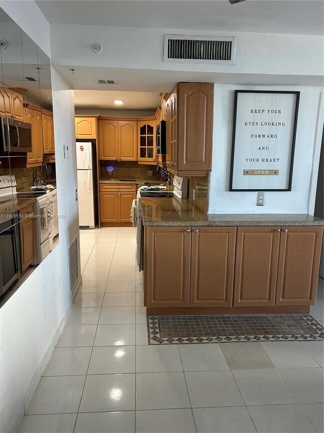 Building Photo - 6969 Collins Ave