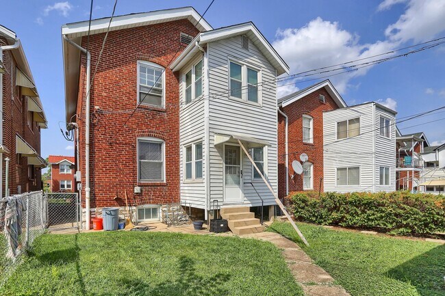 Building Photo - 5036 Tholozan Ave